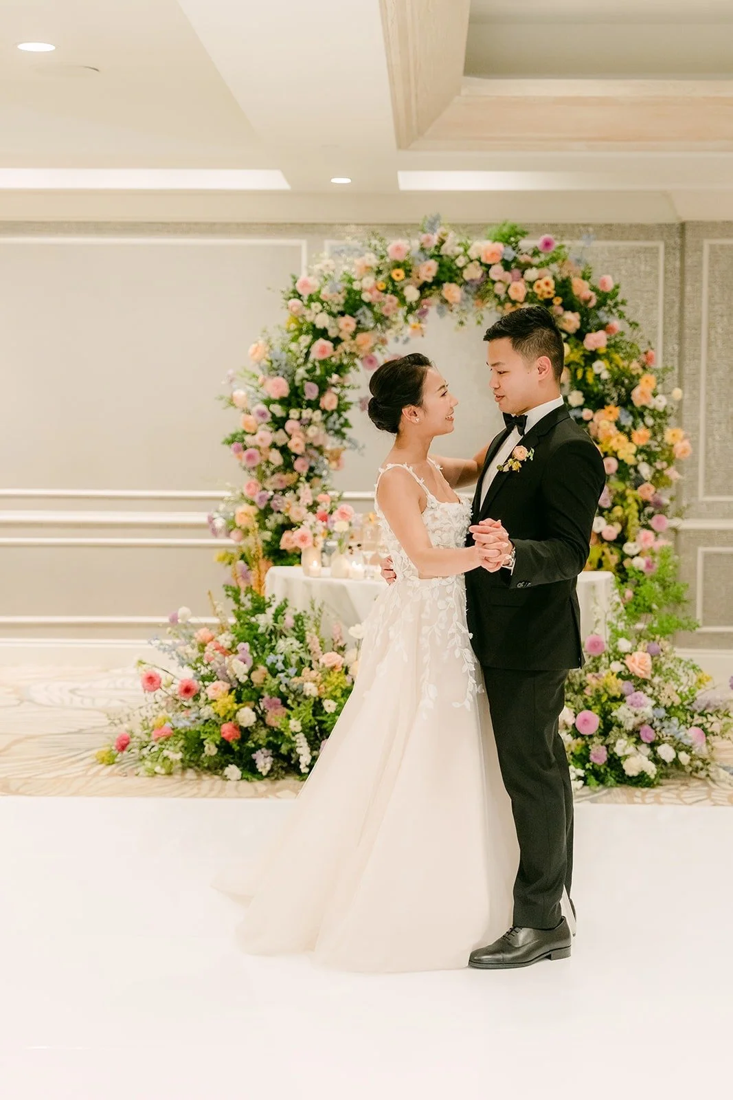 Kylie and Mario dancing in the empty ballroom before guests come in