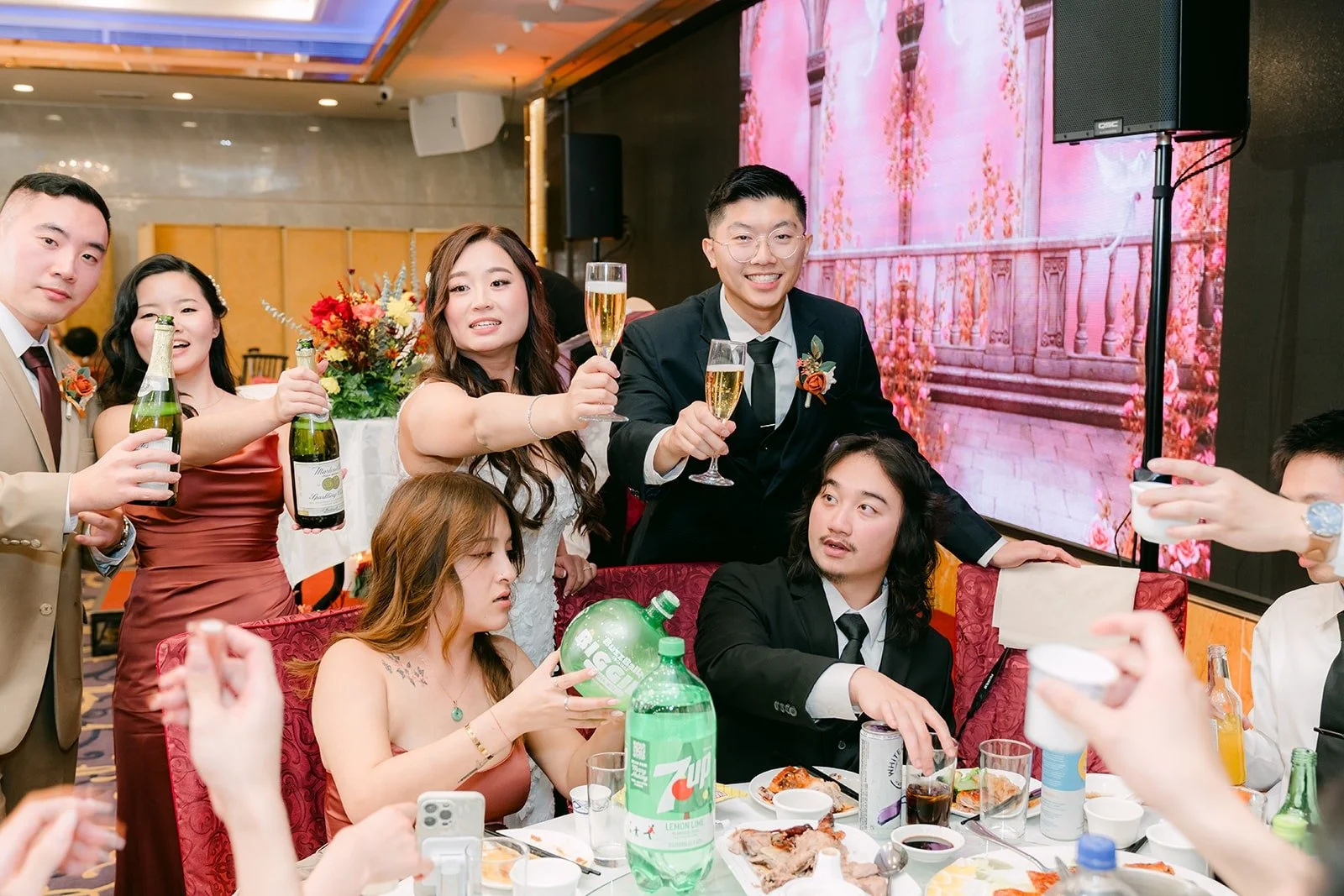 Shayna and Robert visit a table of guests