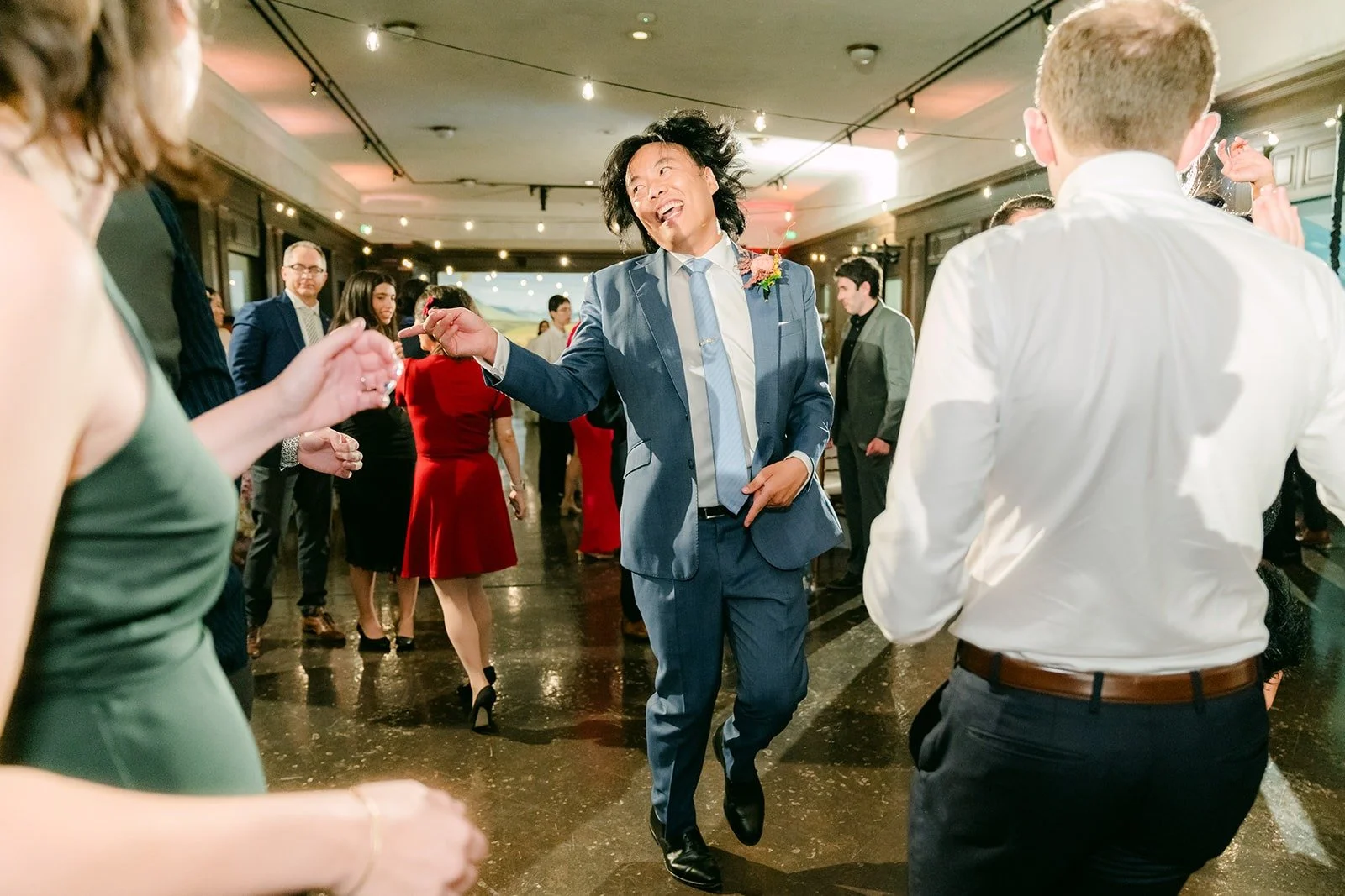 Guests dancing under the lights