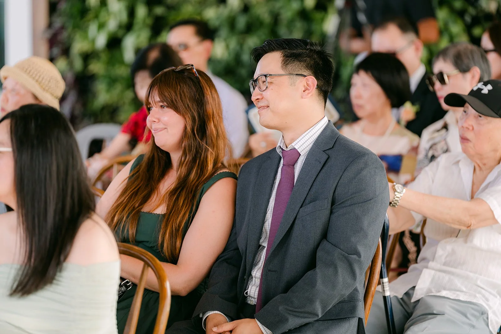 Guests laughing during the ceremony