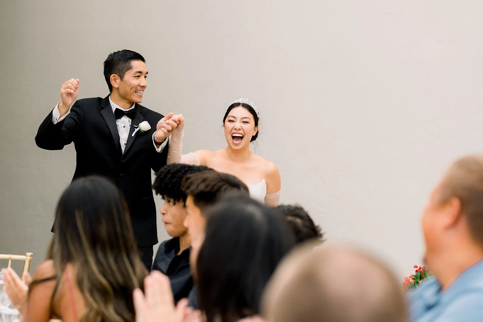 Steven and Jacinda make their entrance as guests cheer