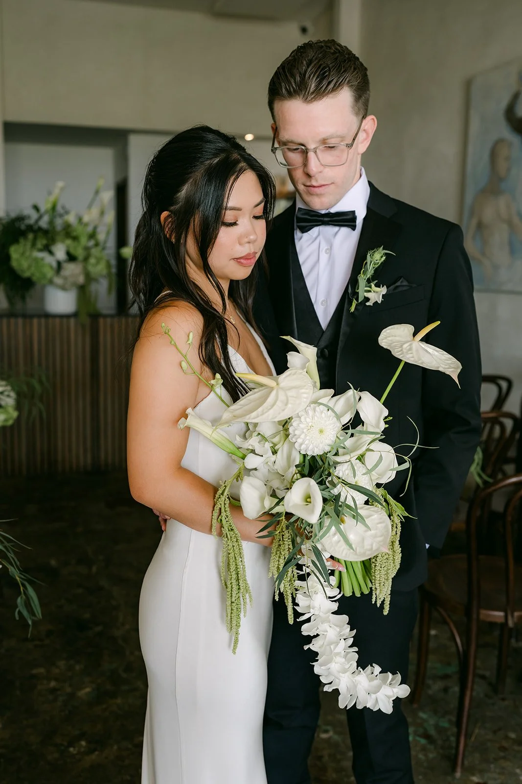 Justine and Matthew with her bouquet