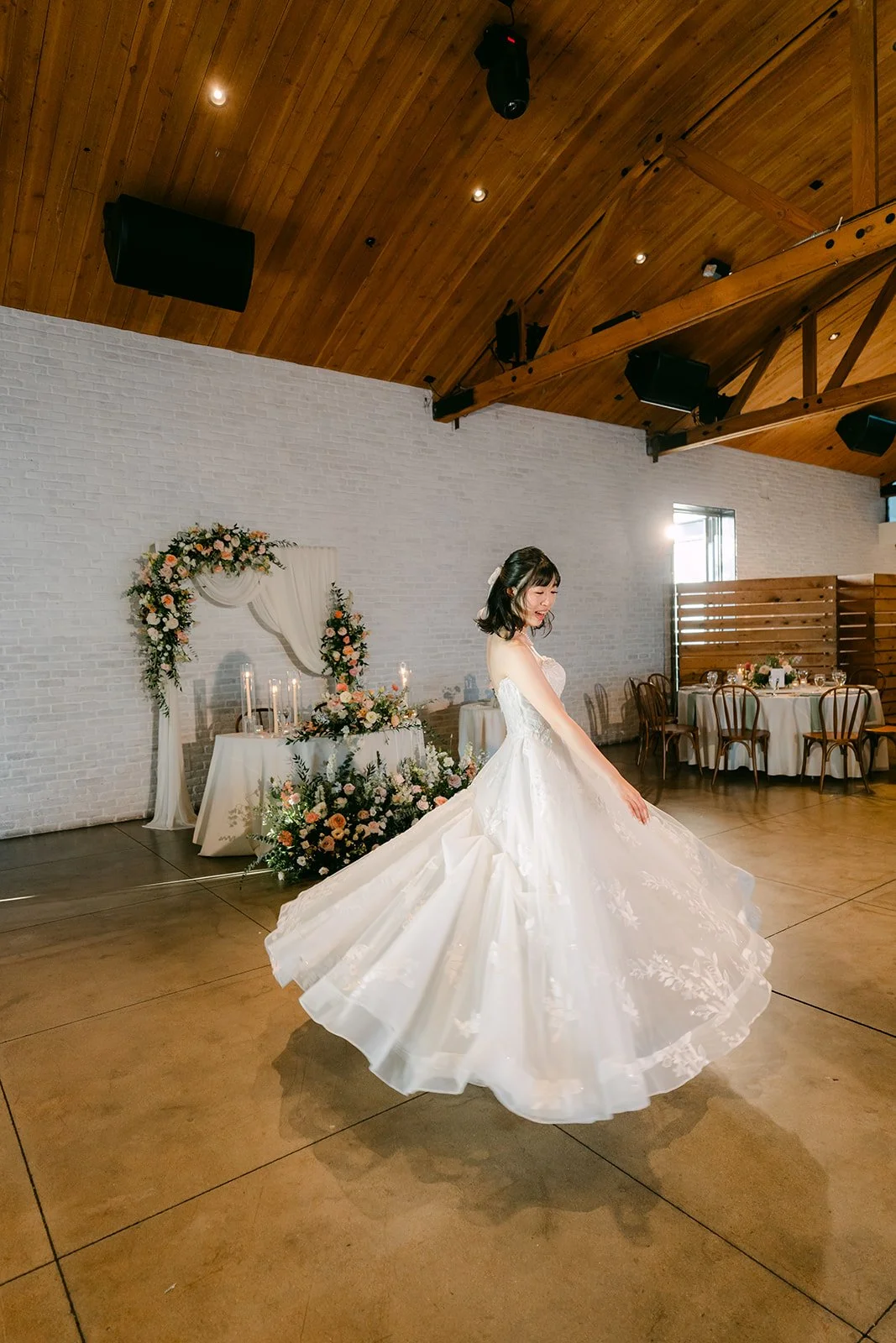 Vivian twirling in her gown in the Great Hall