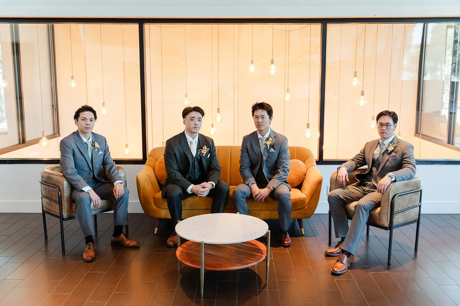 Alex and his groomsmen relaxing in the lounge