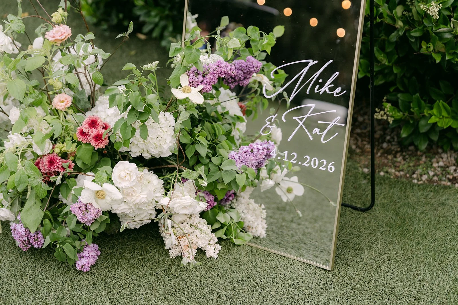 Acrylic Mike and Kat welcome sign with pastel florals