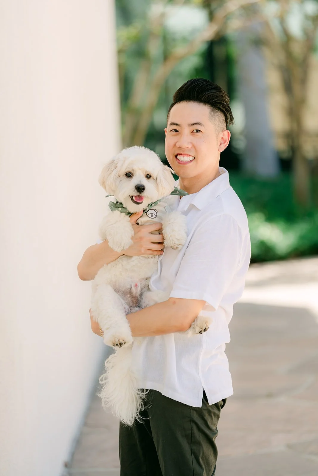 Alan holding Tofu in his arms.