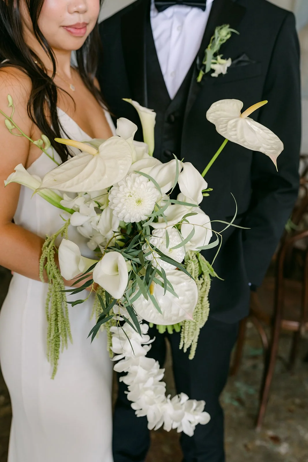 A detail of Justine's cascading white bouquet