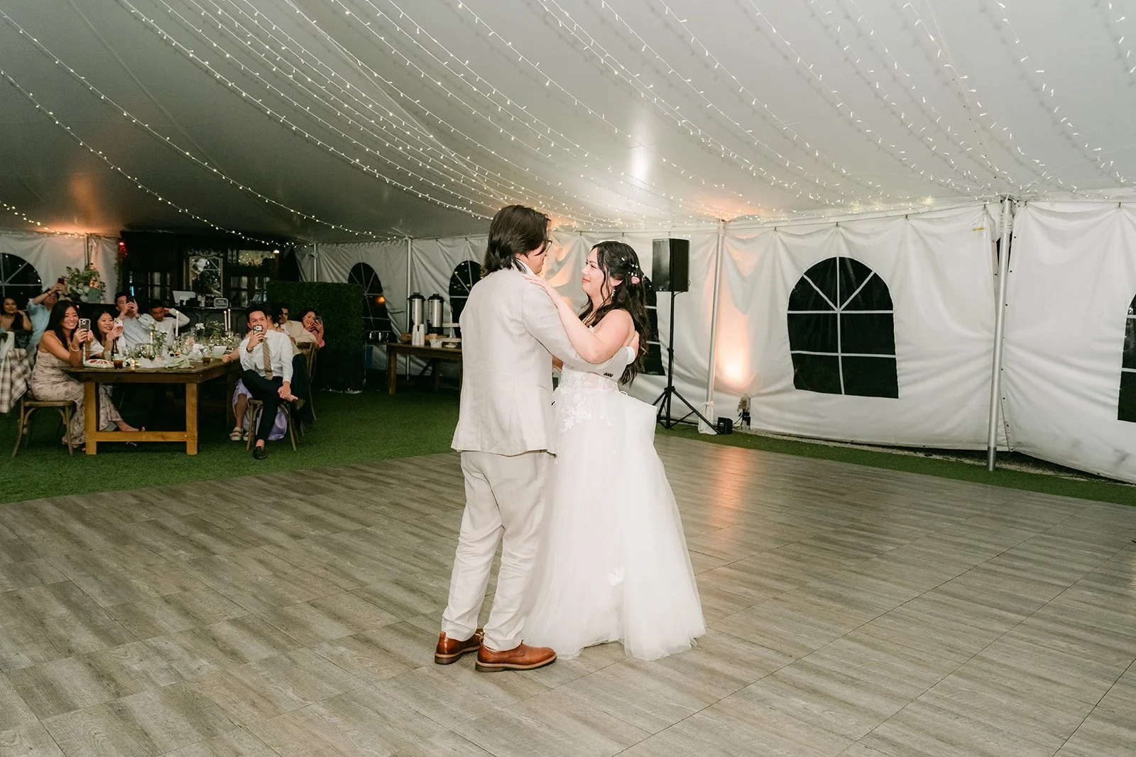 Kat and Mike sharing their first dance in the Open Air Pavilion