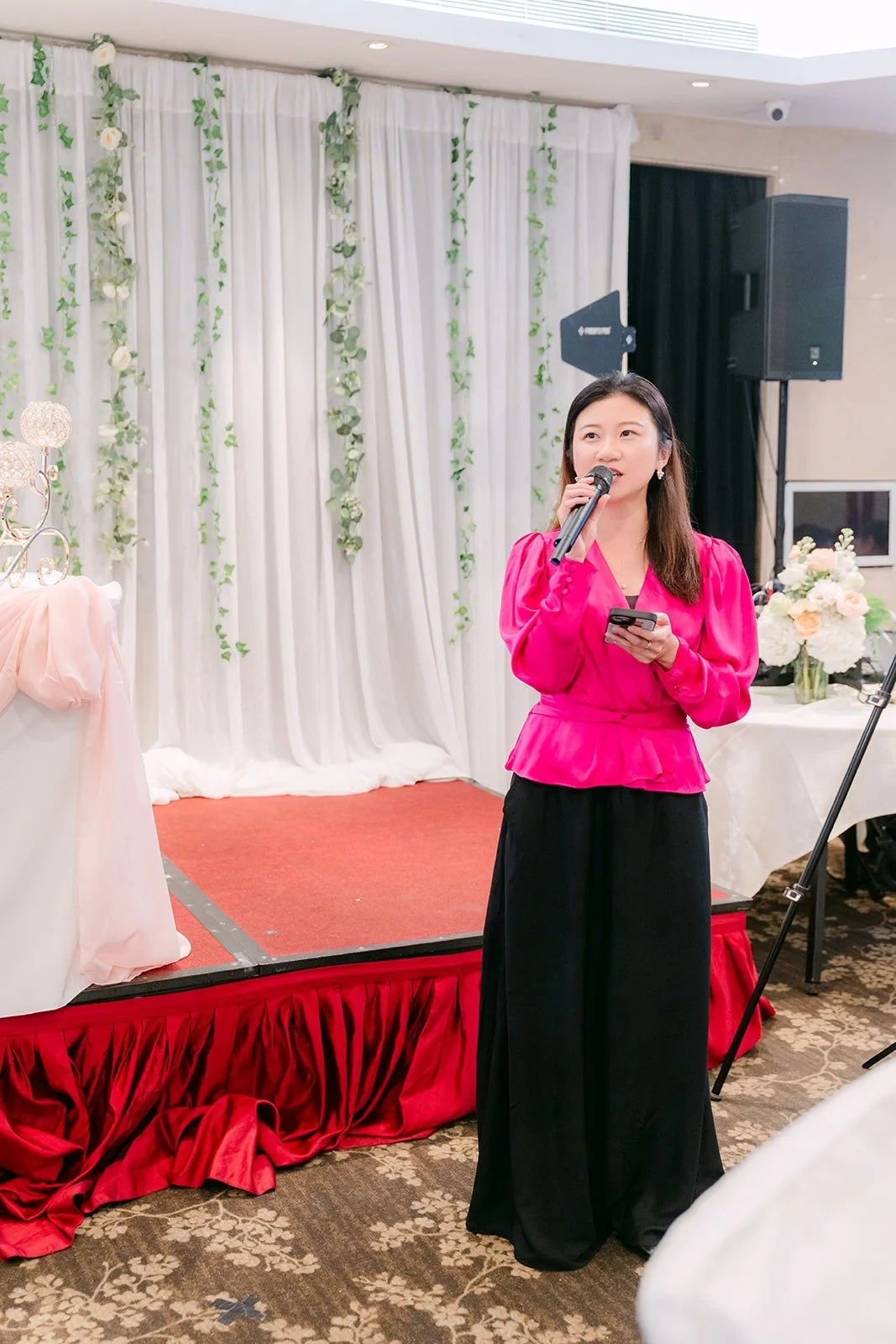 The reception MC welcomes guests from the microphone