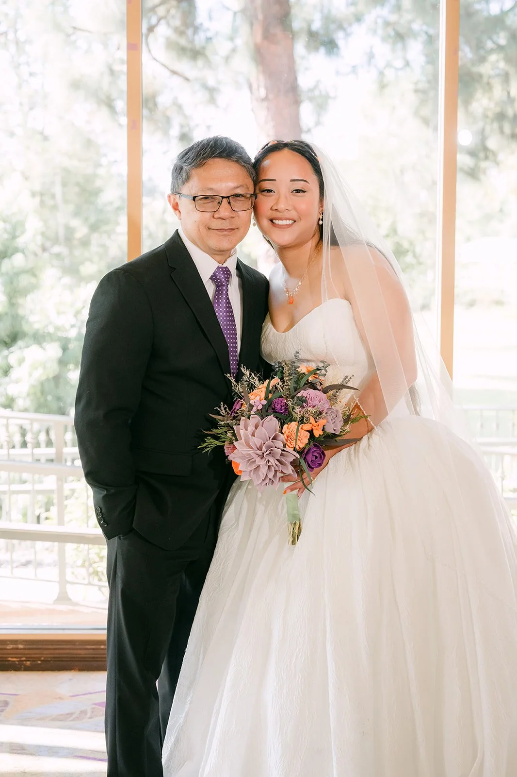 Angela and her dad smiling together