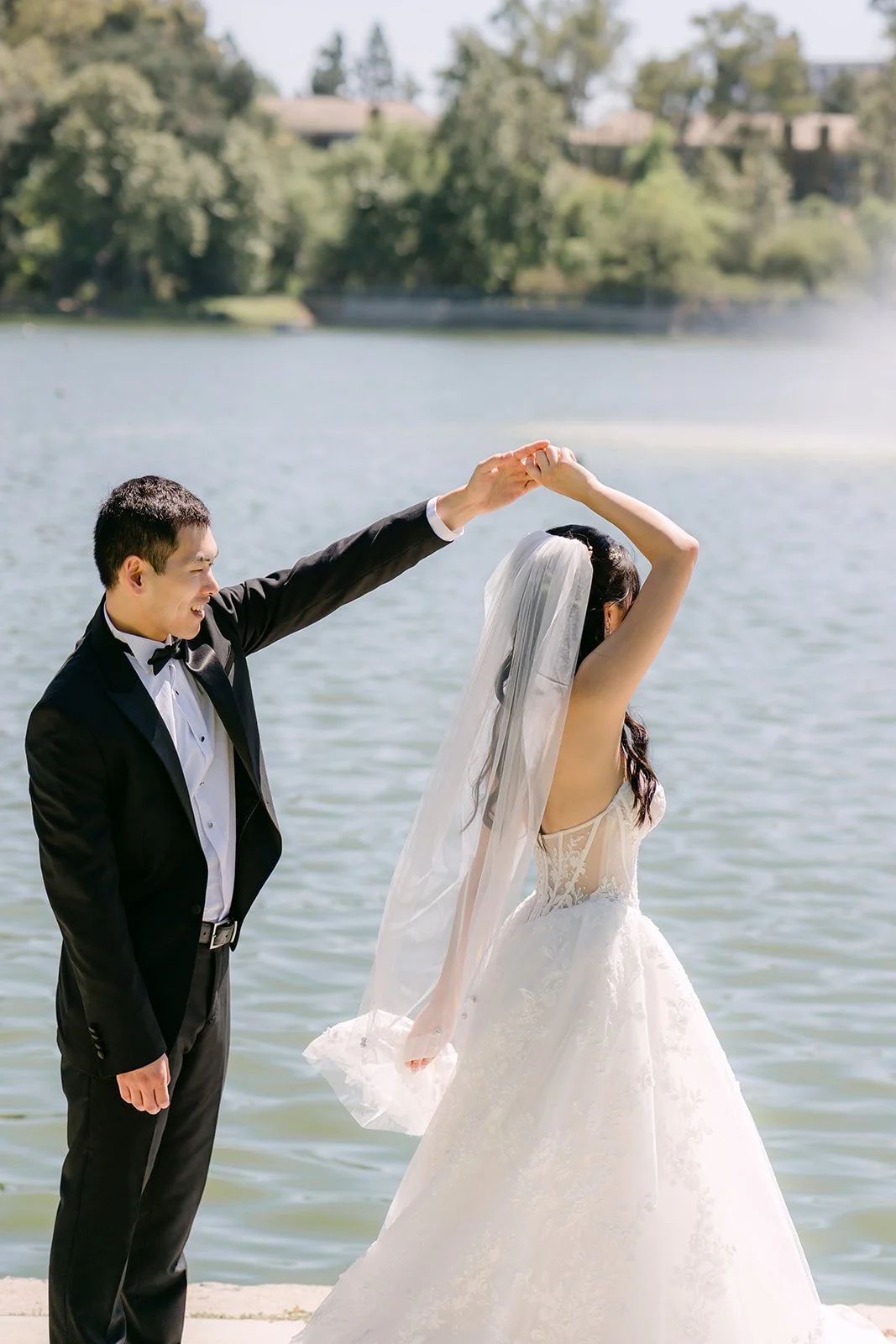 Austin twirling Clarissa by the lake