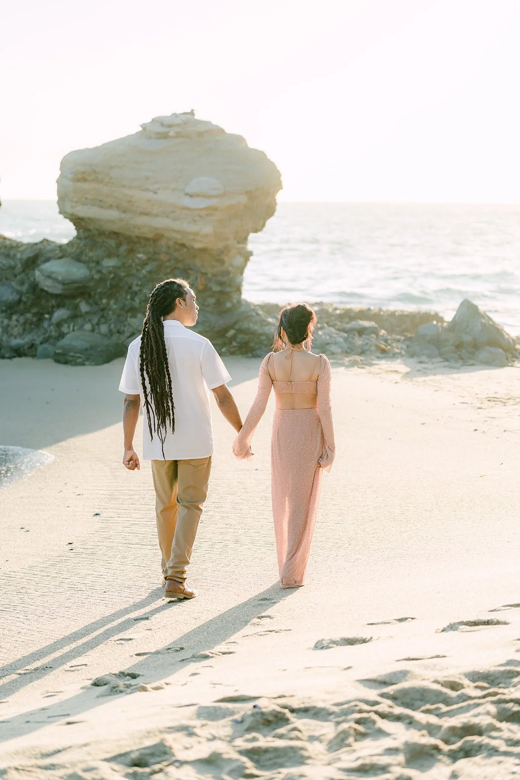 Amy and Michael strolling toward the rock.