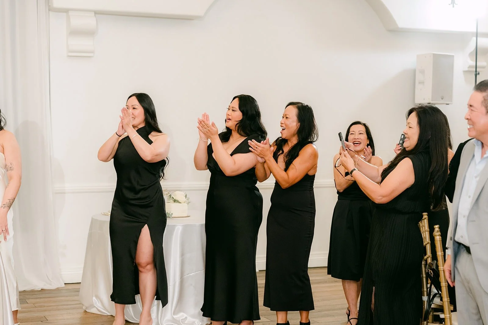Bridesmaids cheering on the dance floor