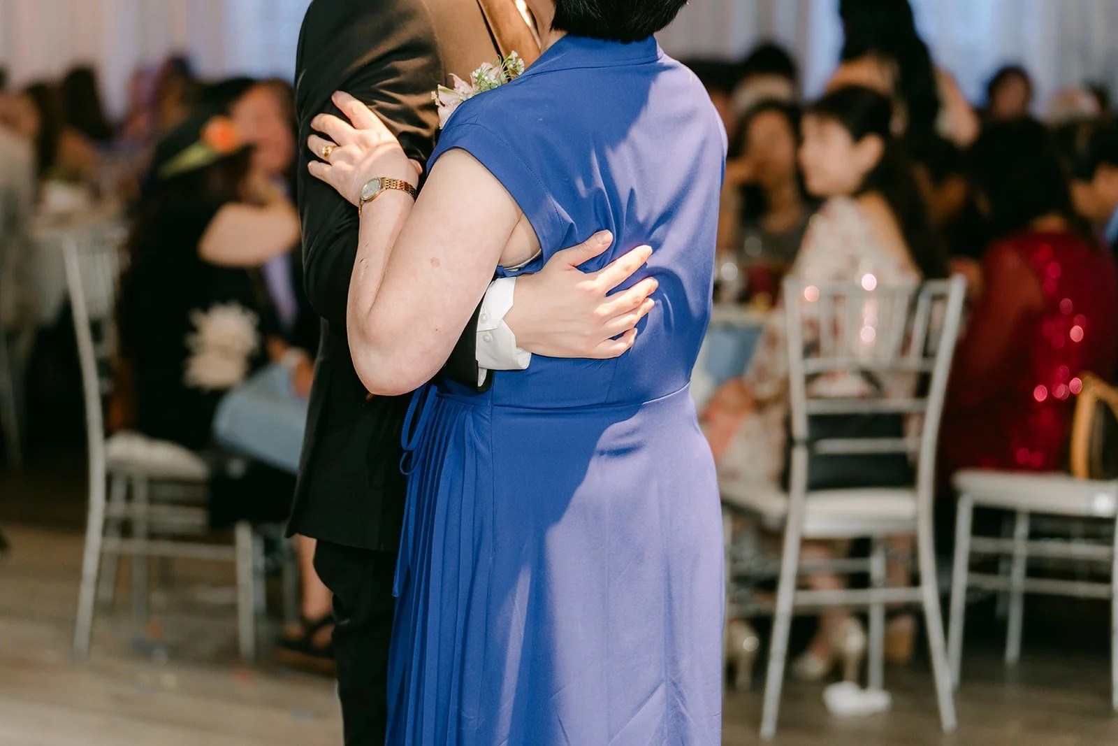 James hugging his mom at the end of their dance