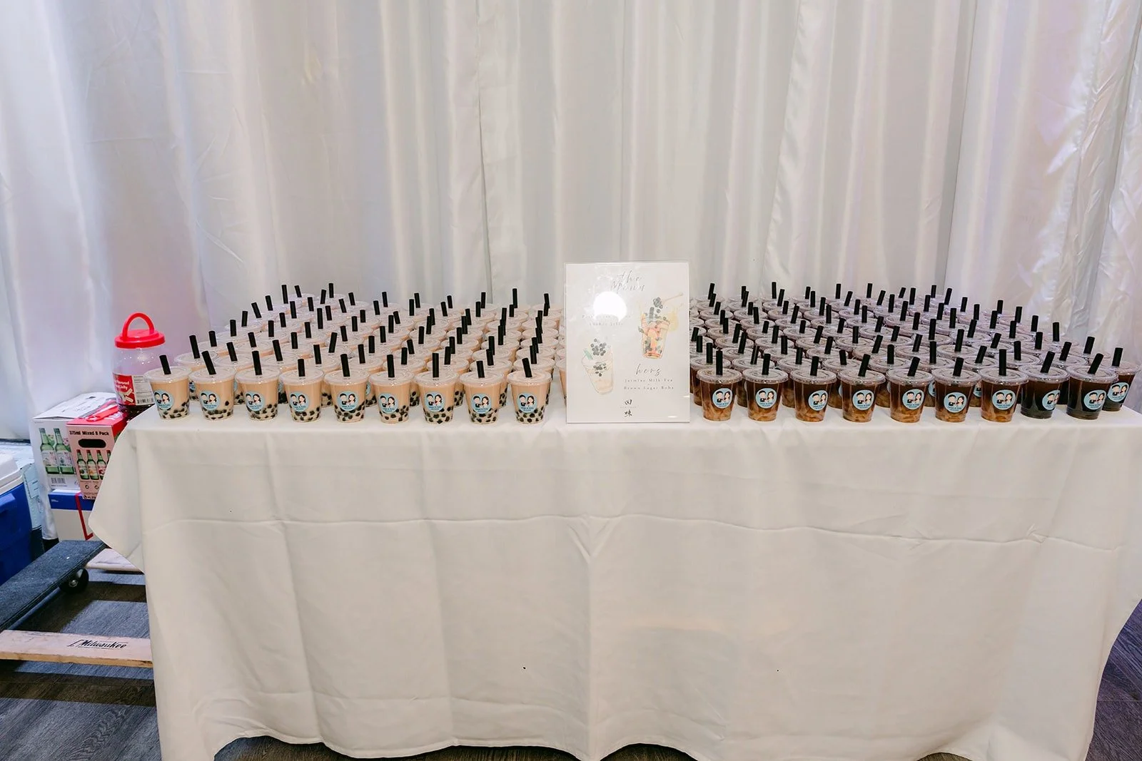 Rows of favors lined up on the welcome table