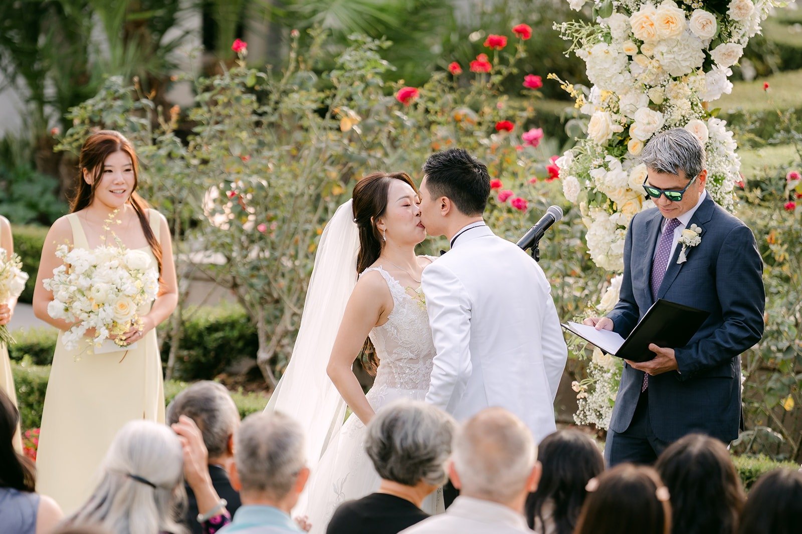 Jenny and Ryan's first kiss at the altar.