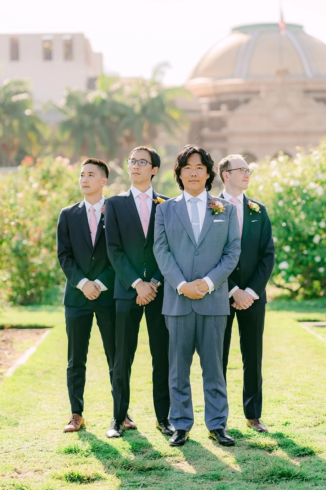 Philip and his groomsmen with the museum dome behind them