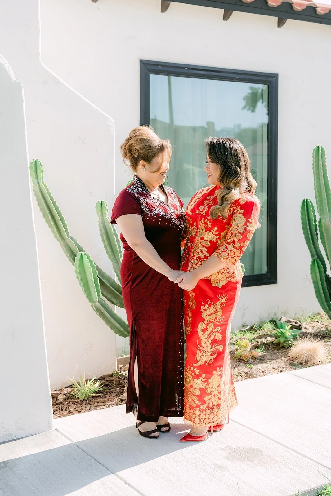 Candice and a family member side by side in traditional dress