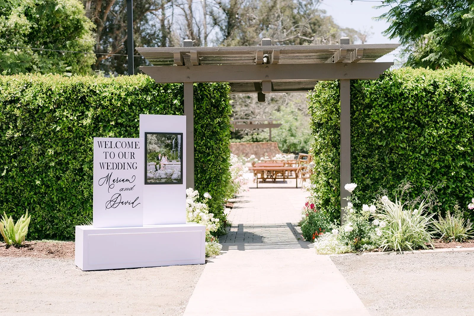 Welcome sign for Mariam and David at the garden entrance of The Walnut Grove in Moorpark