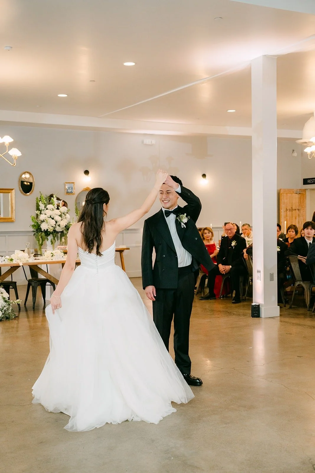Richard spinning Jadee during their first dance