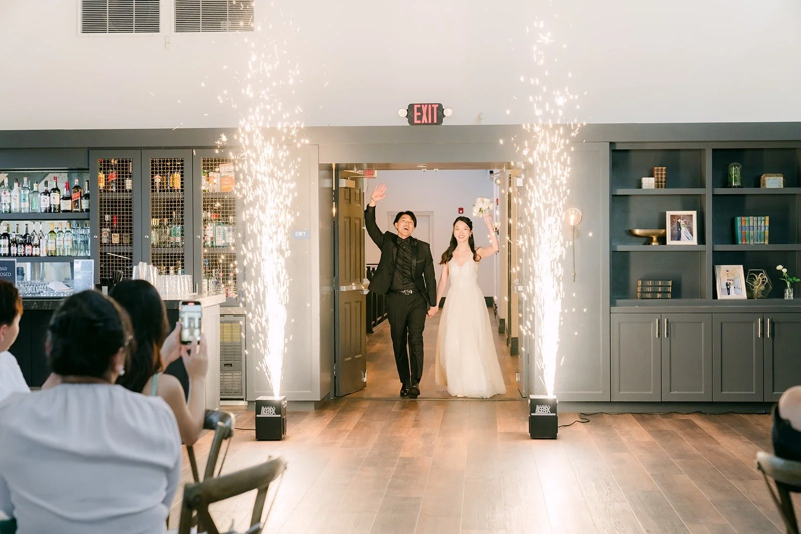 Tin and Fong at the ballroom doors for their grand entrance