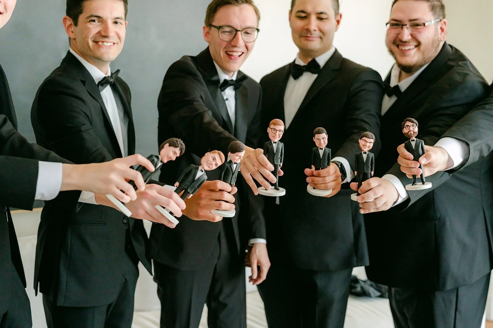 Nik and his groomsmen toasting before the ceremony