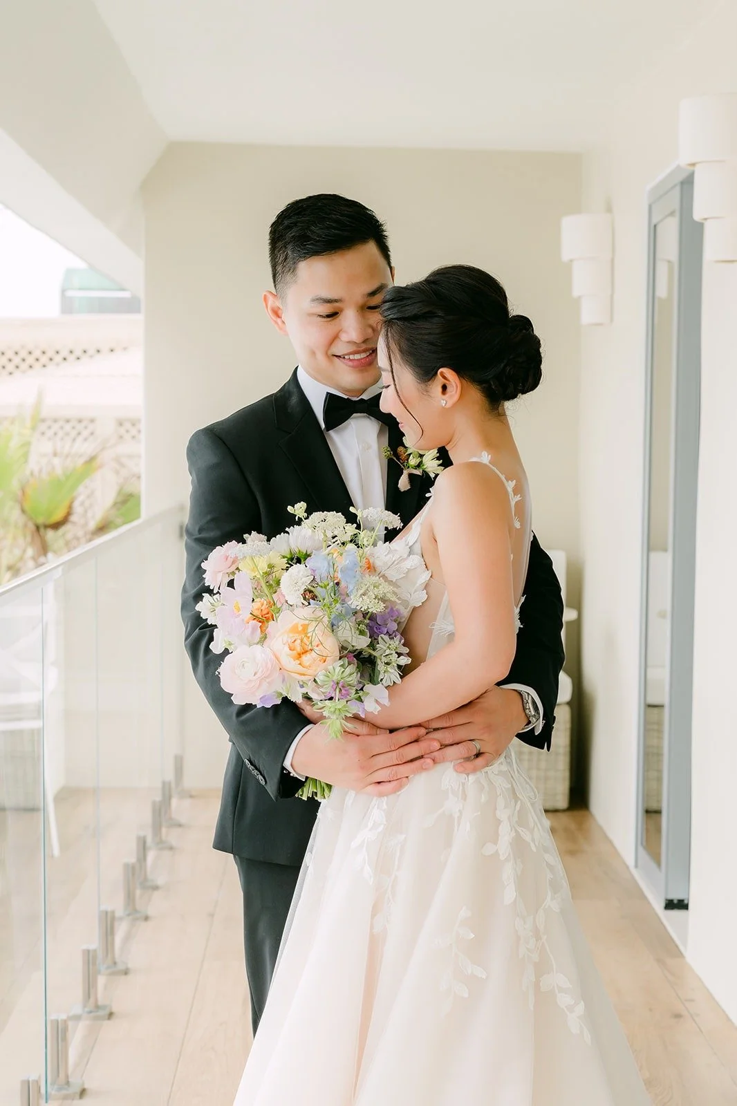 Kylie and Mario holding each other after the first look
