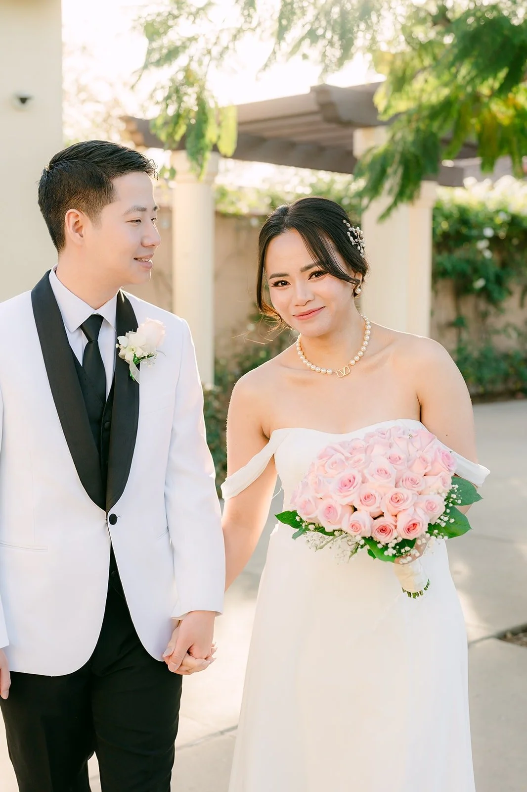 Ivy and Chungman smiling together after their private vows