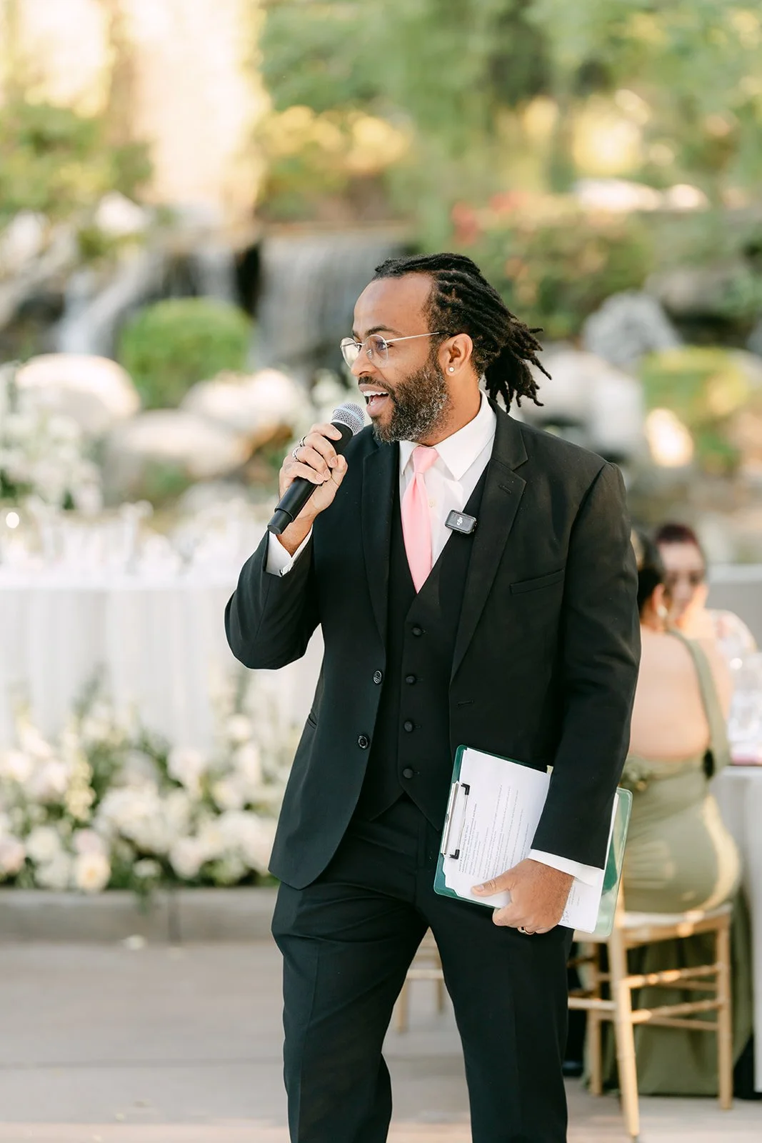 The emcee introducing the wedding party at Coyote Hills Golf Course.