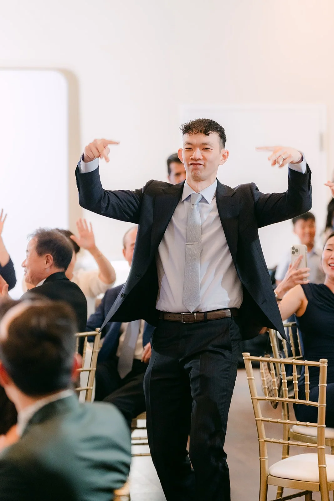 A guest celebrating during the grand prize game