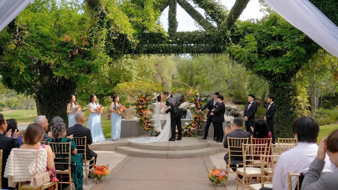 Bridgette and Henrik's ceremony under the draped pergola at Coyote Hills Golf Course