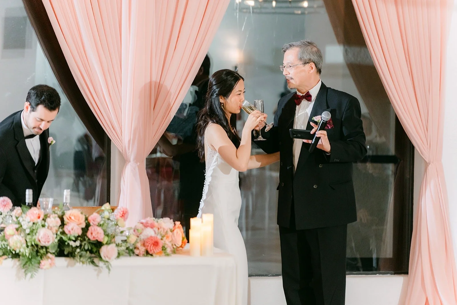 A toast given beside the sweetheart table