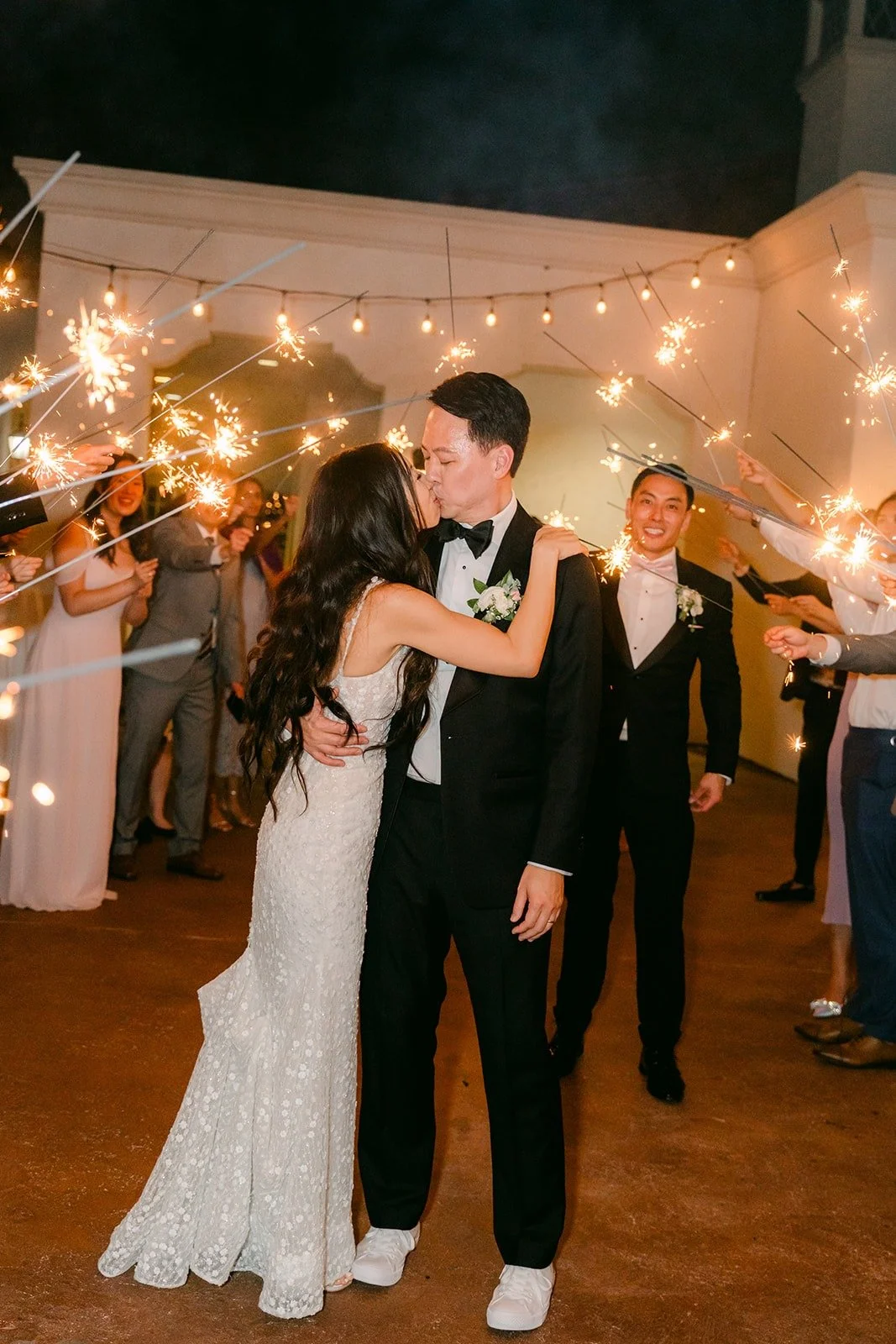 Kristine and William in the sparkler line on the Los Coyotes patio