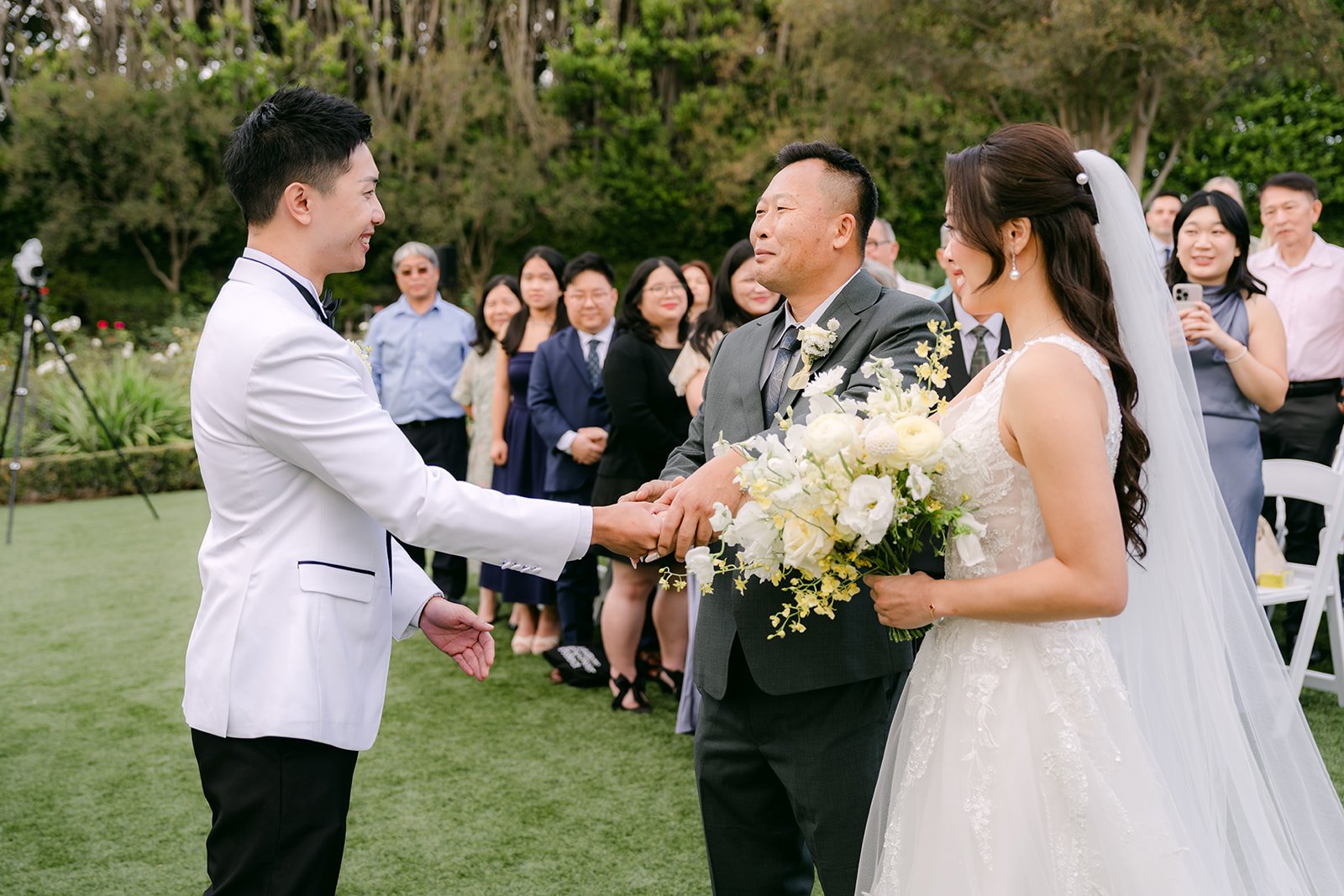Jenny's dad handing her to Ryan at the end of the aisle.