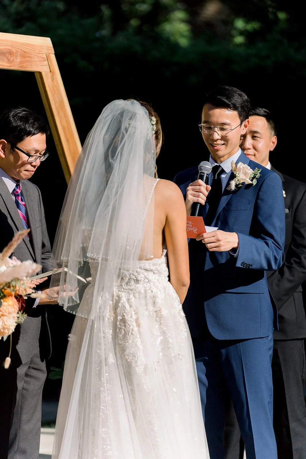 Alex reading his vows to Ariel