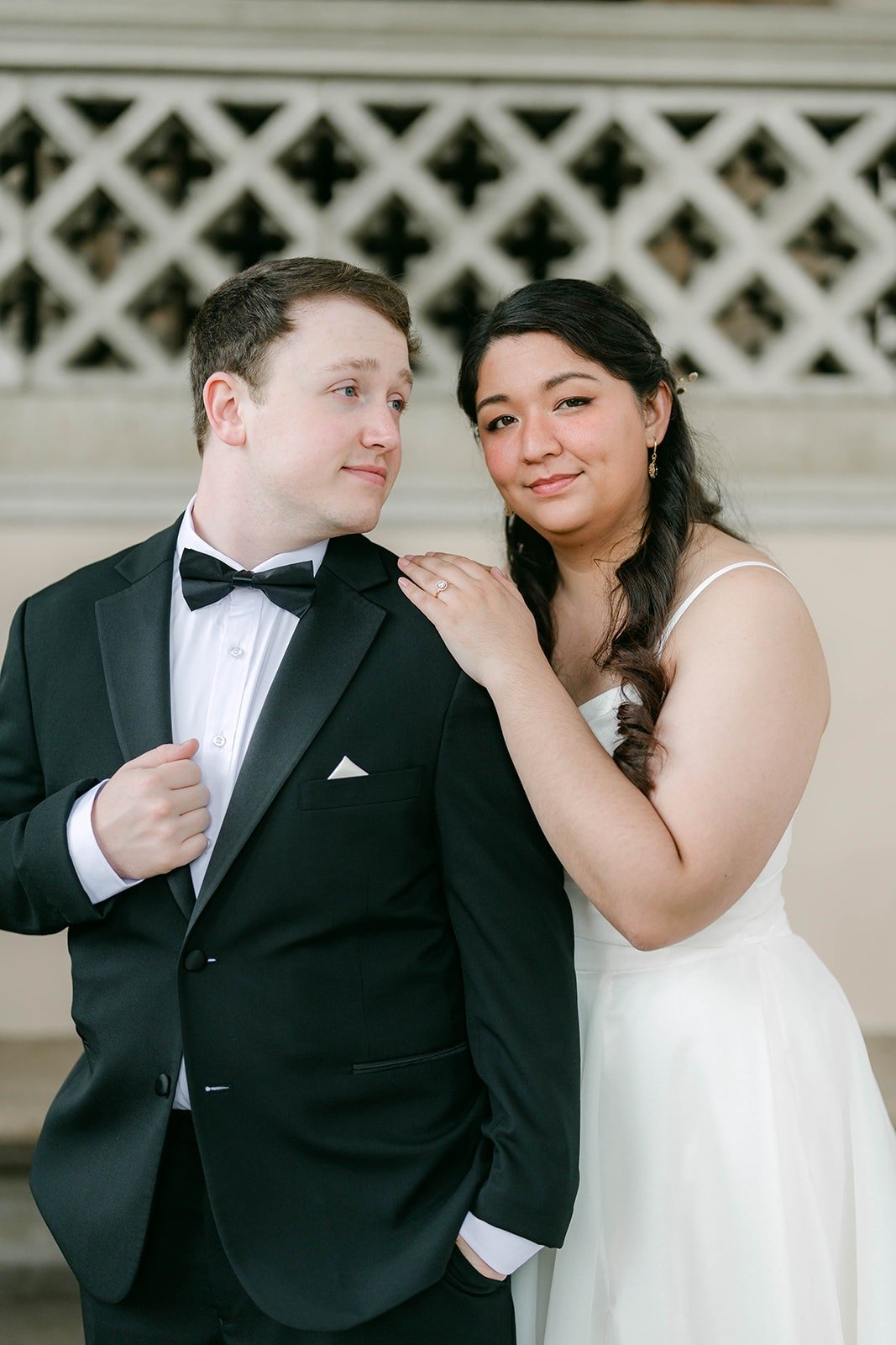 Saira resting her hand on Matthew's shoulder, photographed by One and Only Production
