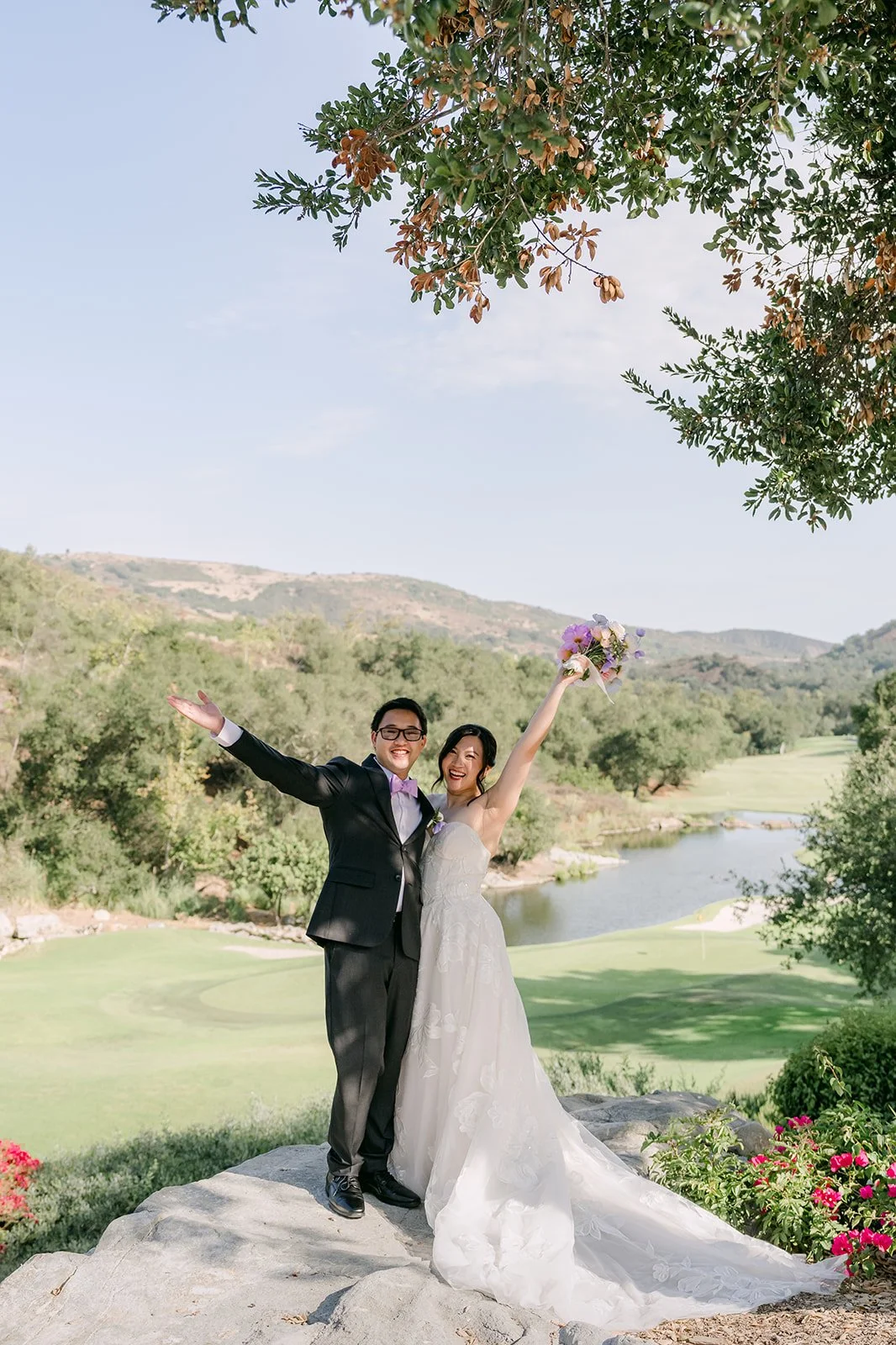 Mary and Patrick cheering above the golf course