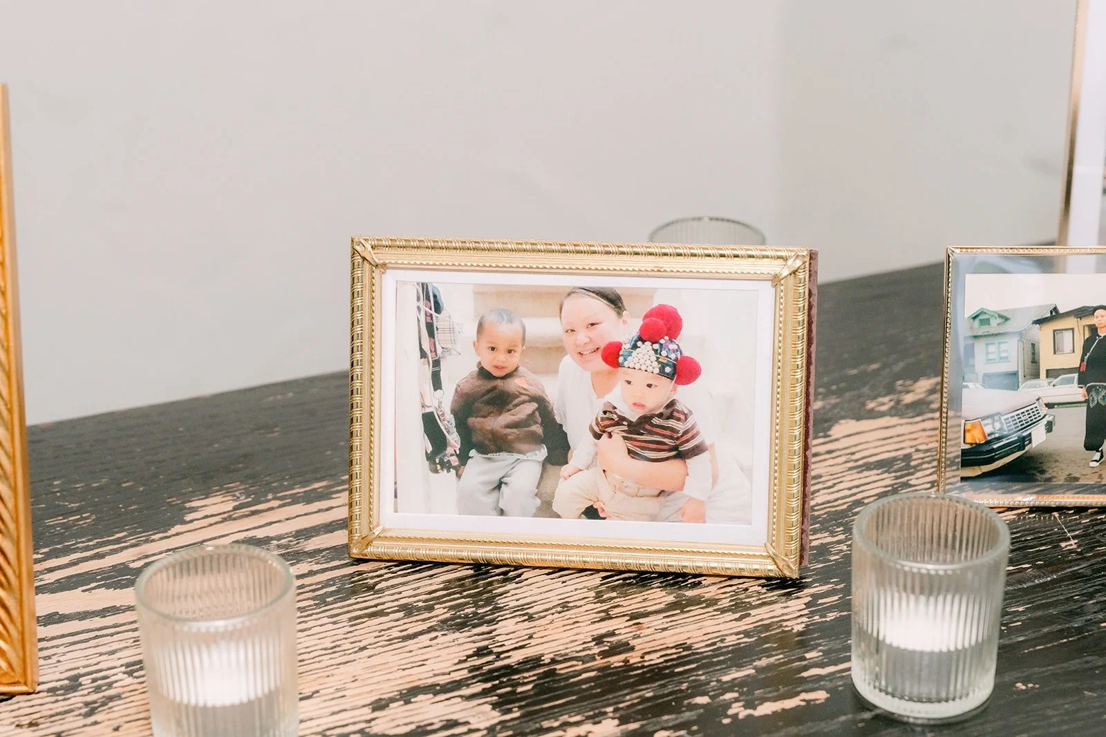 Framed photo and candles on the welcome table