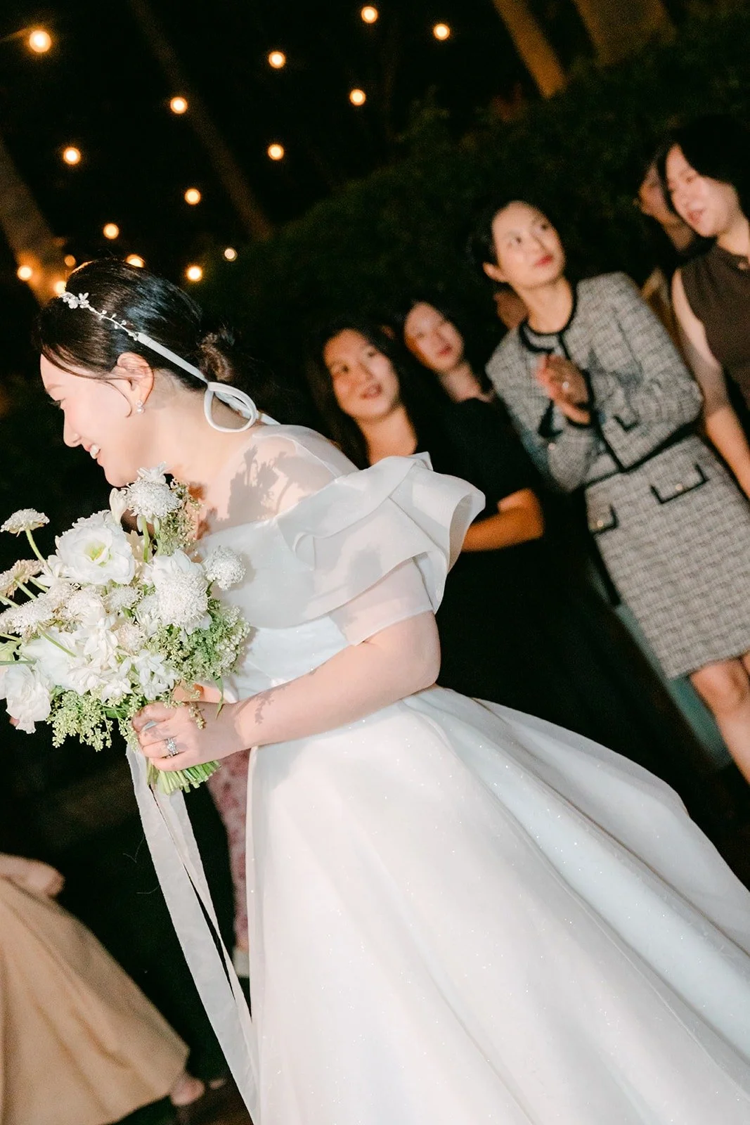 Amy getting ready to toss her bouquet