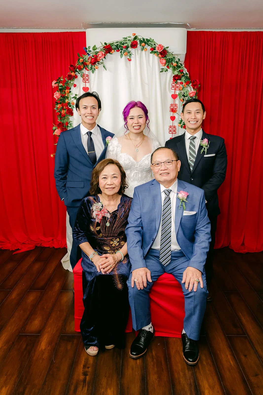 Vanessa and Ryan with Vanessa's parents and brothers.