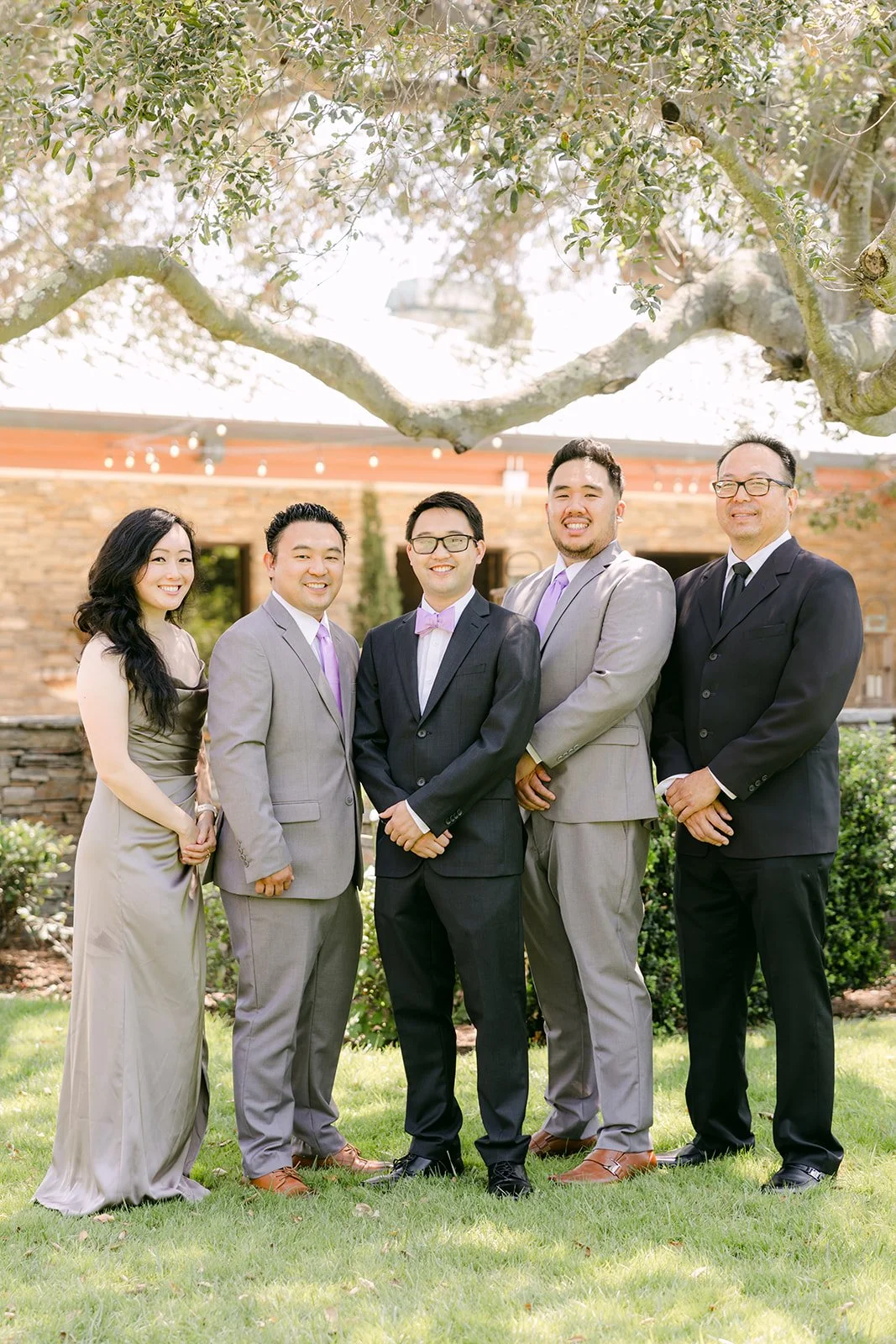 Patrick with his groomsmen in gray suits