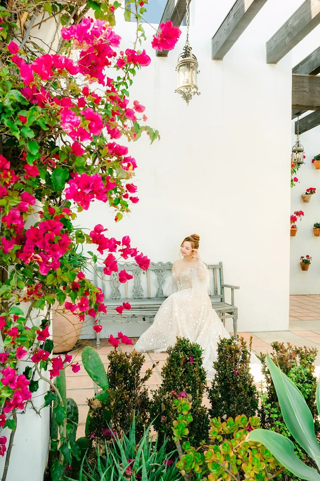 Joanna under the bougainvillea in the La Ventura courtyard