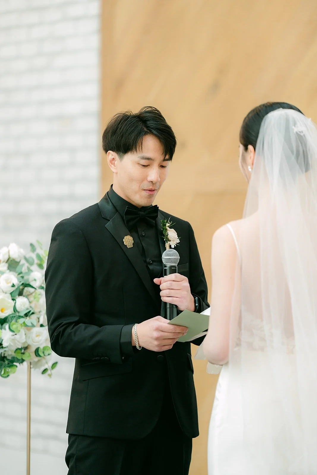 Fong reading his vows