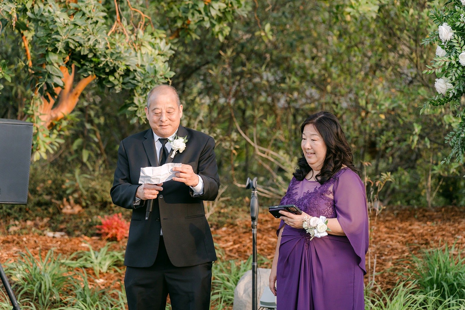Family members giving a welcome speech at the reception at Los Robles Greens