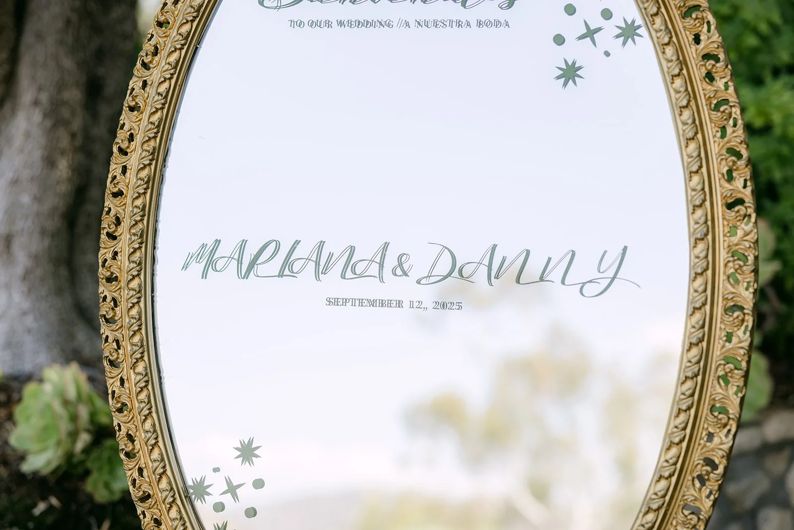 Close up of the welcome mirror lettering