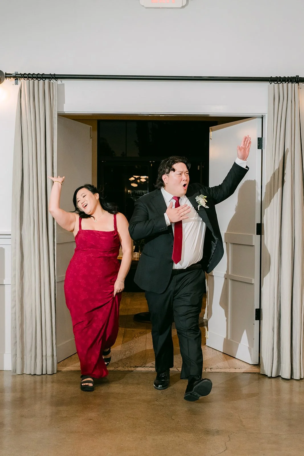 Bridesmaid and groomsman making their entrance
