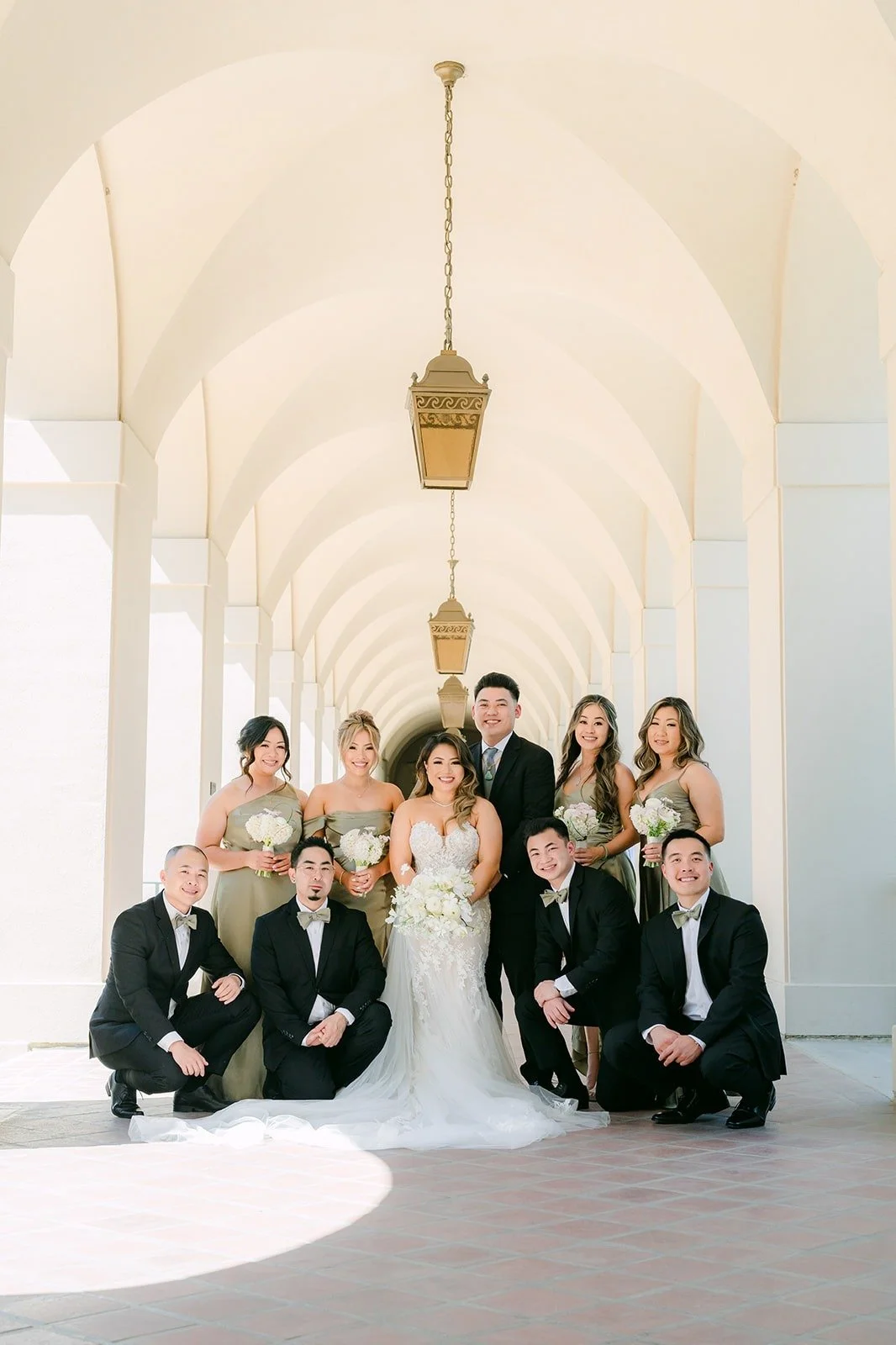 Wedding party posed under the lanterns at Pasadena City Hall