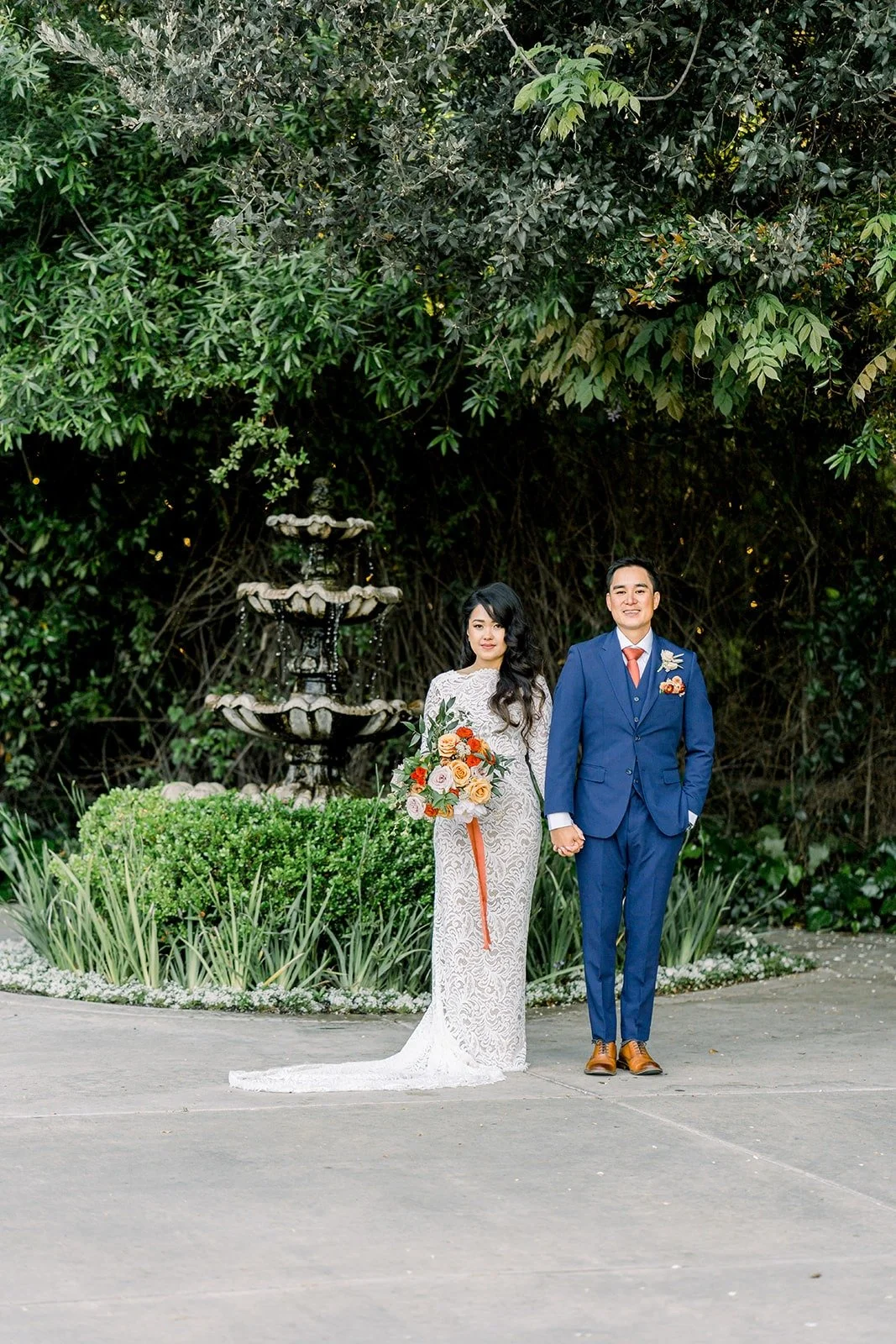 Hannah and Vincent standing by the fountain