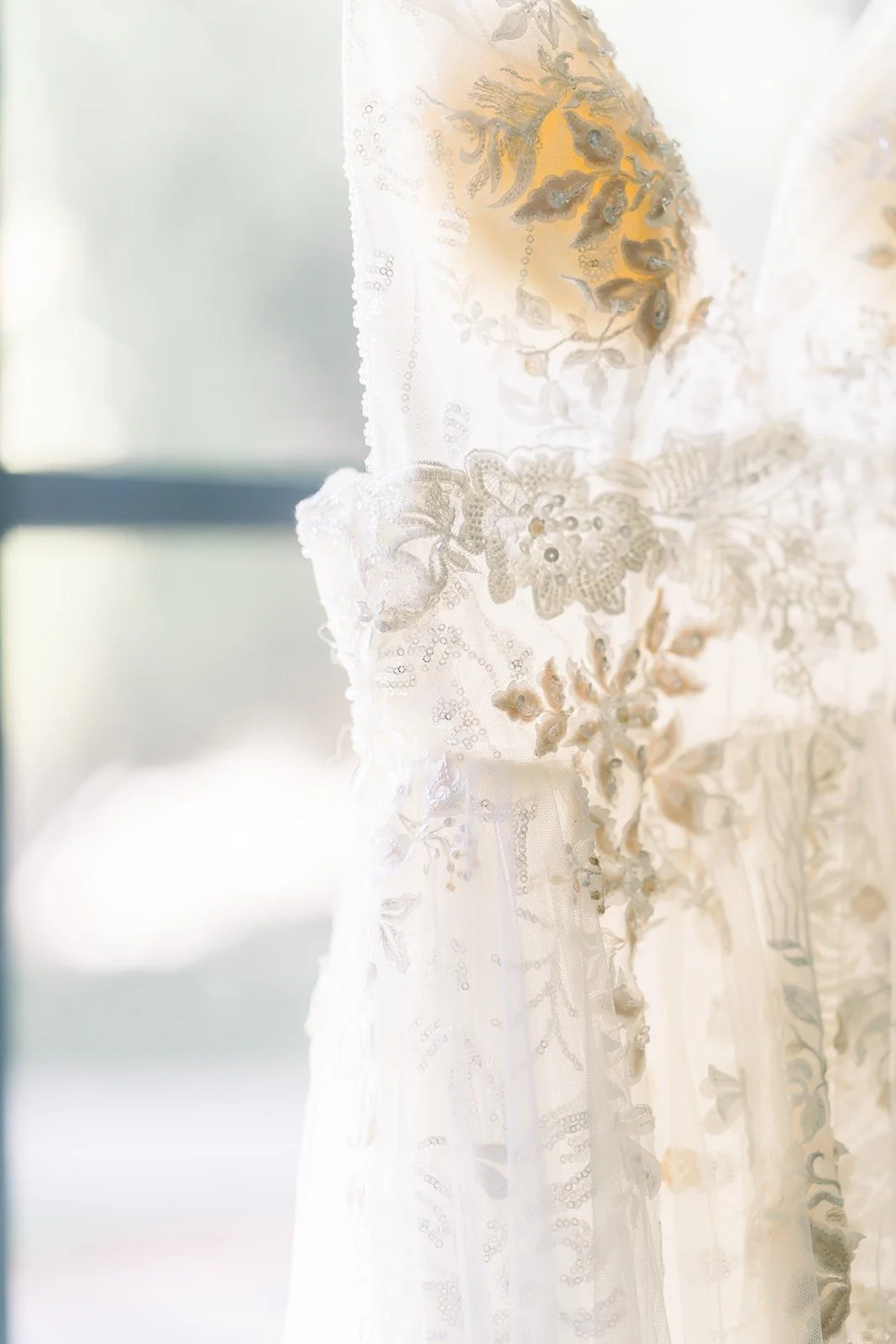Close up of the floral lace on Ariel's gown