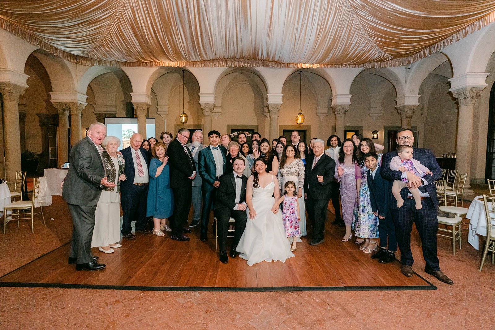 Saira and Matthew with all of their guests on the West Patio